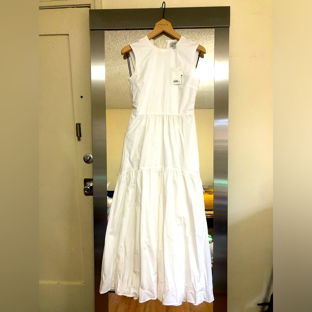 Cos Brand New white dress with light thin makeup line neck line
